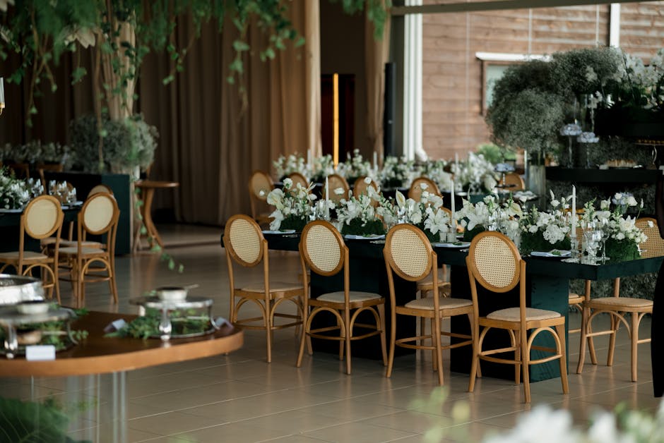 Elegant indoor event setup with floral arrangements