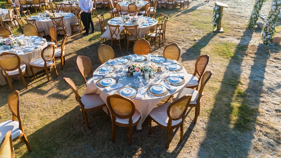 Outdoor event tables during golden hour